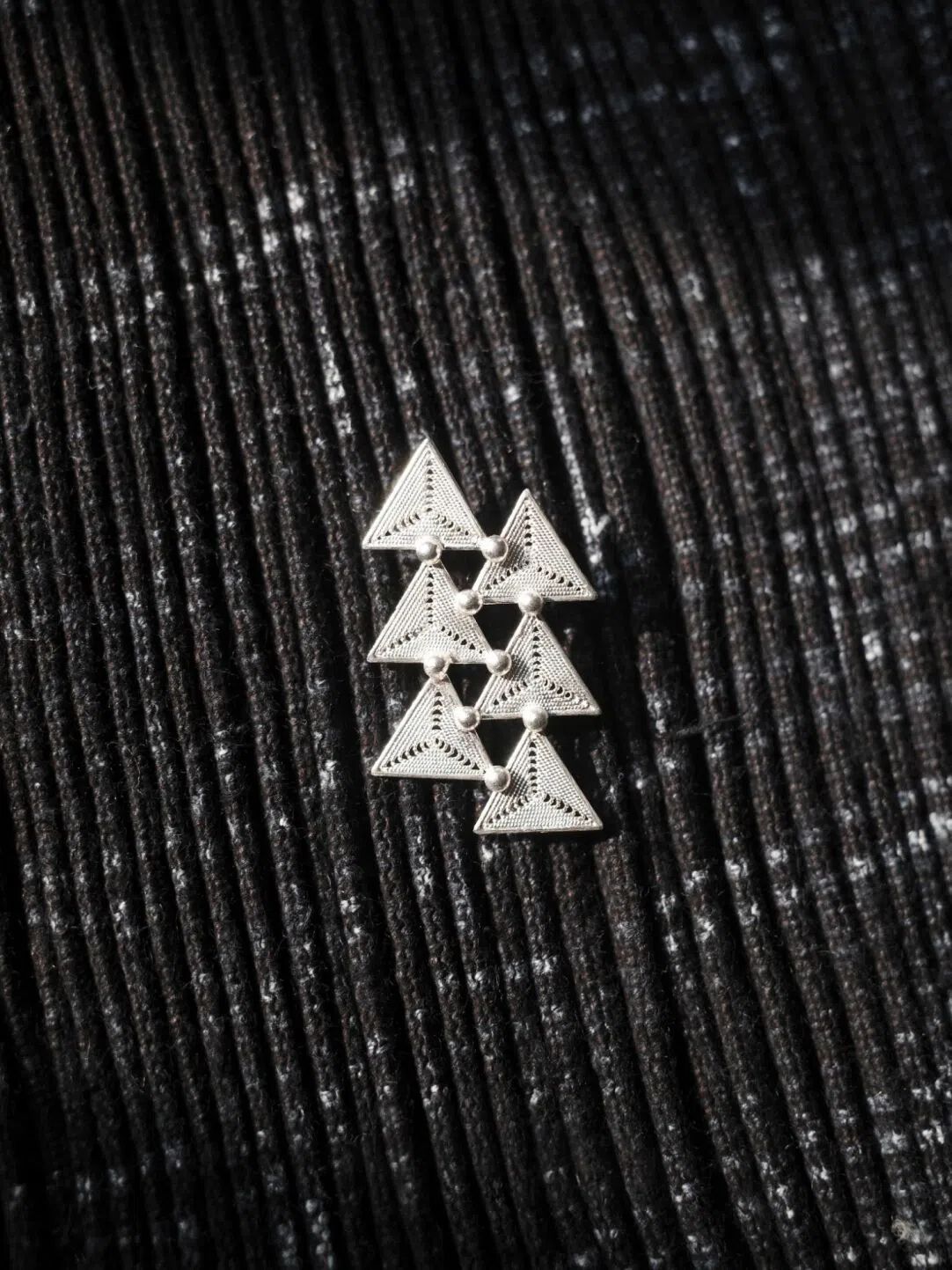 Hand-finished silver earrings